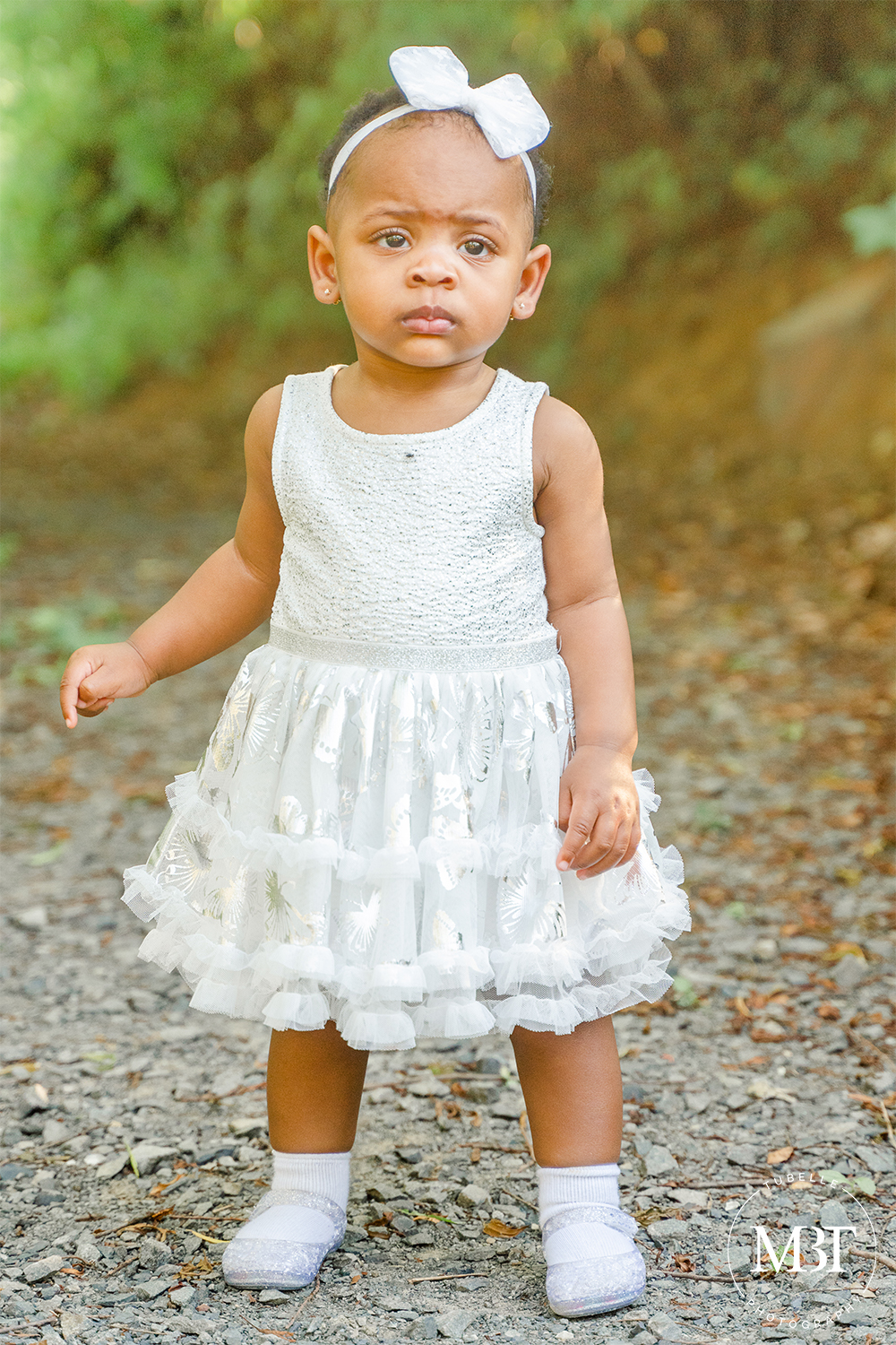 toddler standing taken in Loudoun County by a children's photographer in DMV