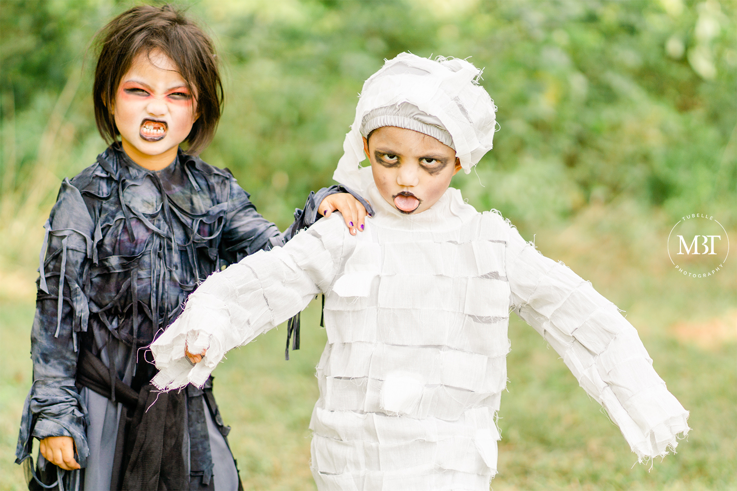 kids wearing mummy & zombie costumes at a halloween themed session in Chantilly, Virginia taken by a DMV family photographer