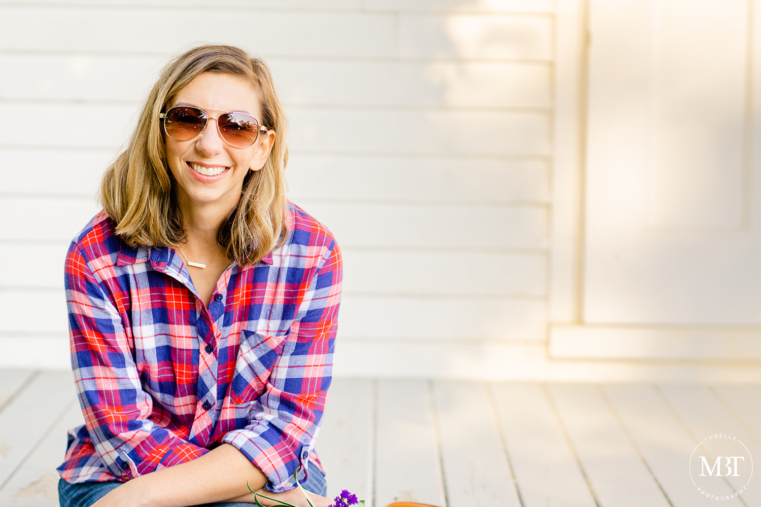 lifestyle session - fashion blogger wearing a plaid button down shirt, taken in Alexandria, Virginia by a Virginia branding photographer