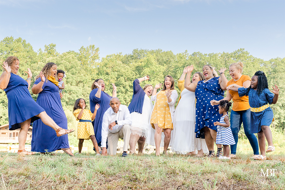multiple families during their extended family session in Triangle, Virginia by a Virginia family photographer