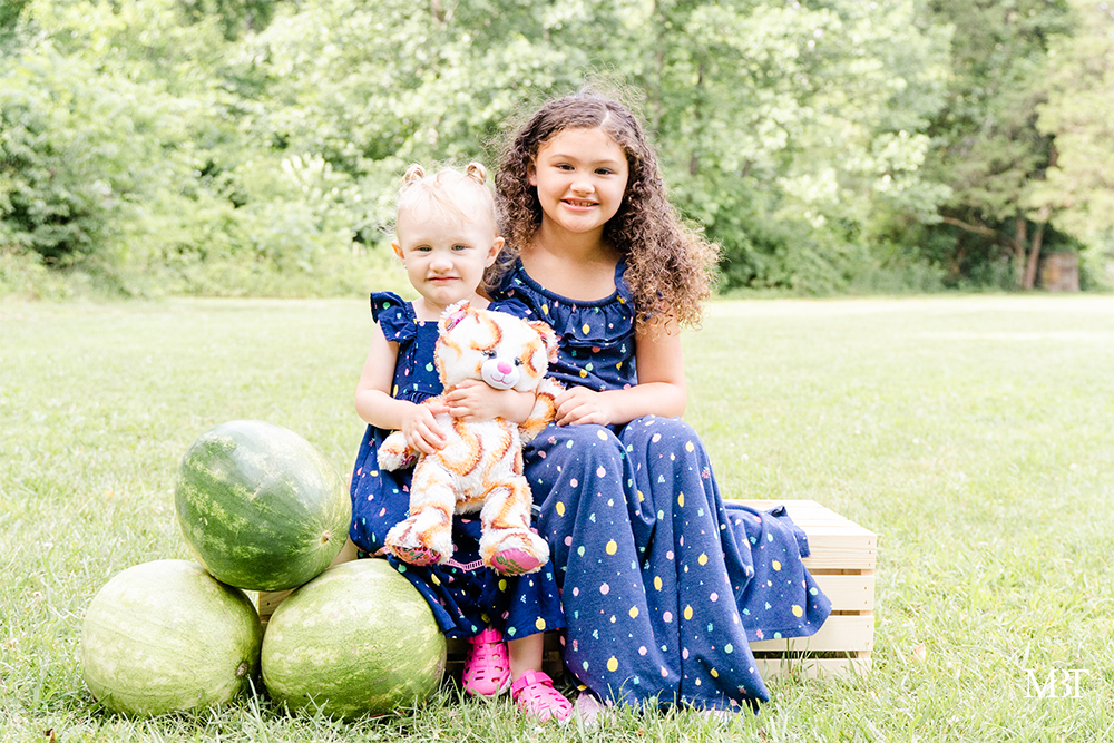 siblings during their watermelon session in Chantilly, Virginia by a Washington, DC children's photographer