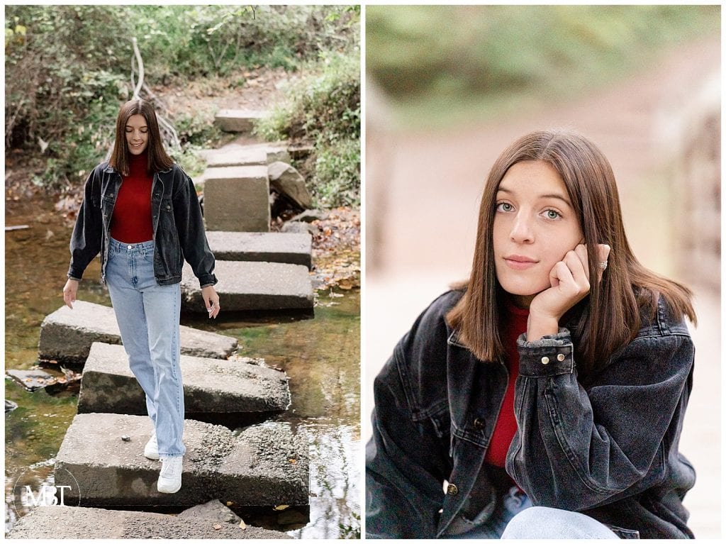 girl wearing a red sweater, jeans, and black jean jacket during her senior session at EC Lawrence Park in Chantilly, Virginia, taken by TuBelle Photography, a Virginia senior photographer