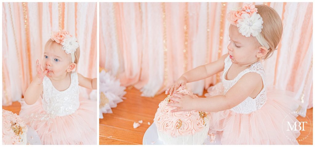 baby girl enjoying her cake during her cake smash pictures in Gainesville, Virginia by TuBelle Photography, a Northern Virginia cake smash photographer