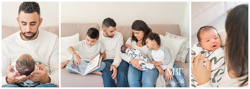 big brother reading to baby sister while baby is held by mom and dad during their lifestyle newborn photos in Gainesville, Virginia, taken by TuBelle Photography, a Northern Virginia newborn photographer