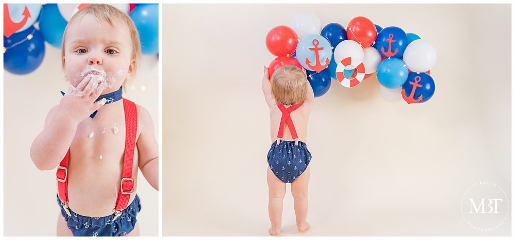 baby boy playing with balloons during his nautical themed cake smash session in Reston, Virginia taken by TuBelle Photography, a Fairfax County cake smash photographer