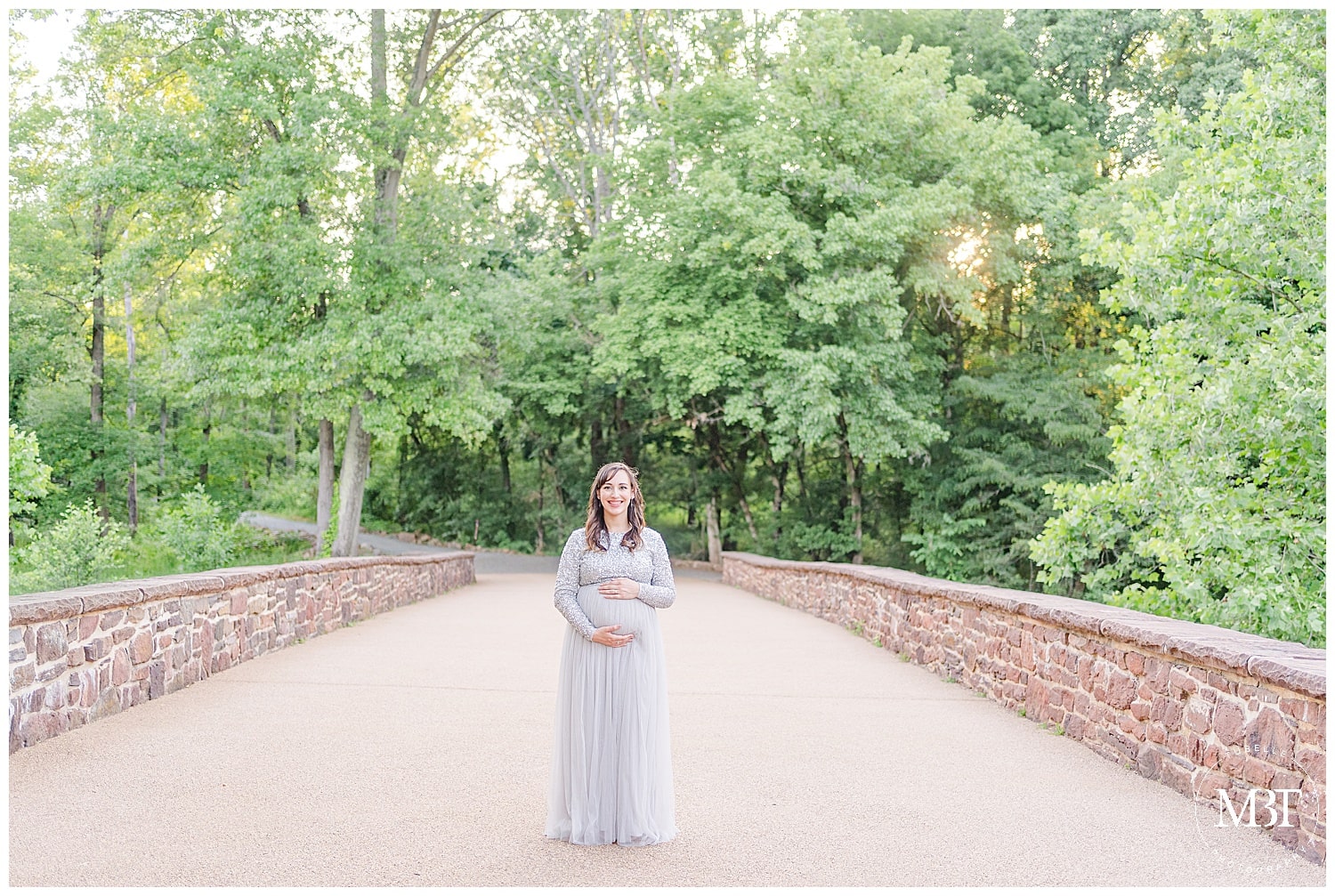 expecting mom excited for her baby during her Manassas, Virginia maternity photo shoot, taken by TuBelle Photography, a Prince William County maternity photographer