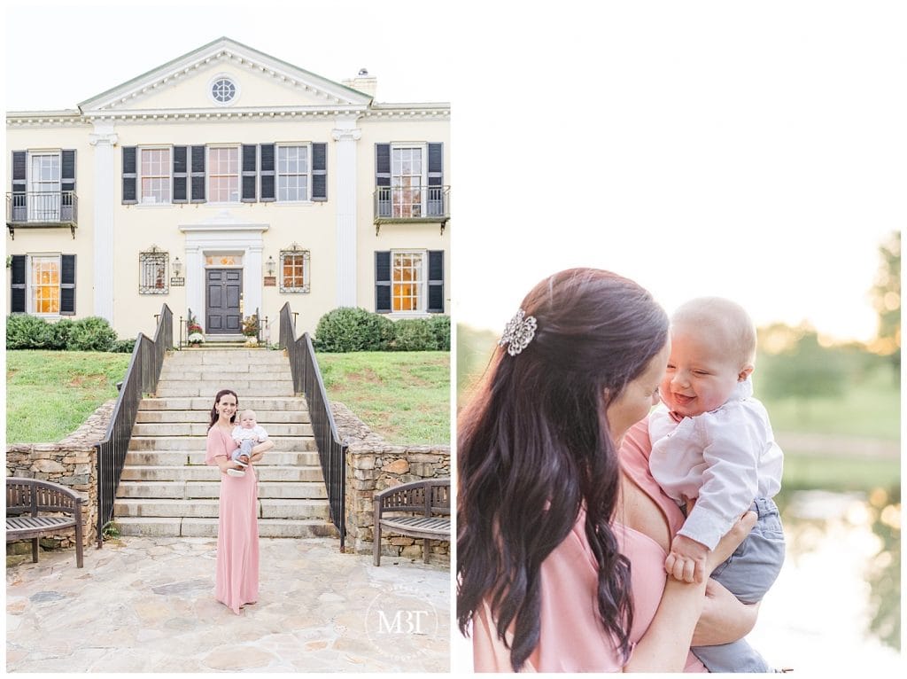 Mom holding a smiling baby boy in front of a big estate at Airlie in Nothern Virginia for their fall family session taken by TuBelle Photography, a DMV Family Photographer.