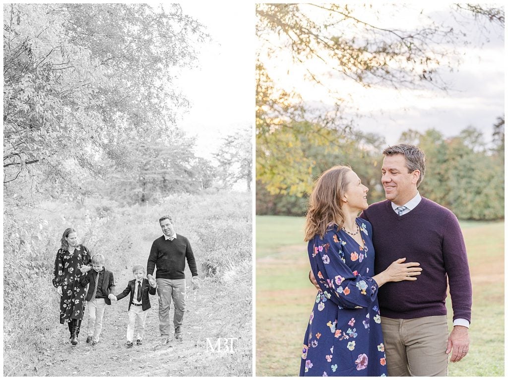 Mom and dad holding their sons' hands and smiling at one another at their fall family portraits in Northern VA taken by TuBelle Photographer, a DMV Family Photographer.