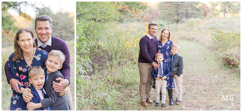Mom, Dad and two sons pose in a field at their fall family pictures at Ellanor C. Lawrence Park taken by TuBelle Photography, a DMV Family Photographer.