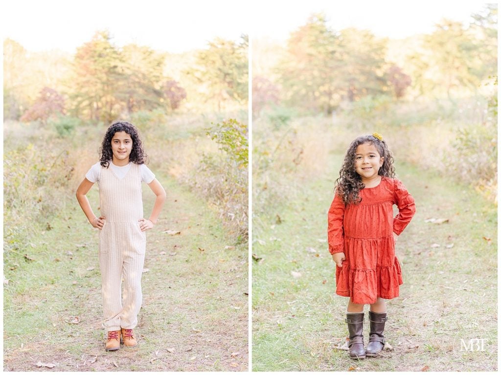 Two sisters pose with hands on hips at their fall mini session in Chantilly, Virginia. Taken TuBelle Photography, a DMV Photographer.