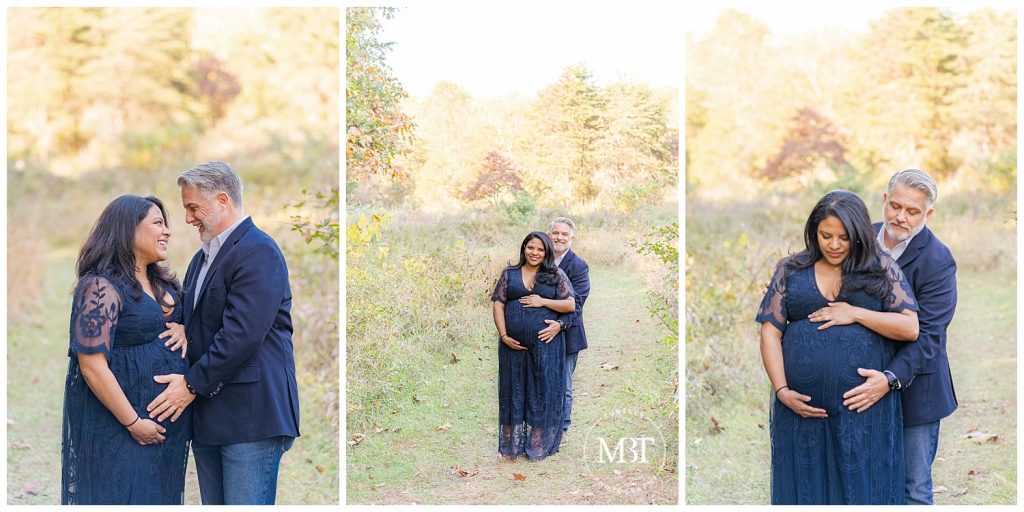 Expecting couple smiles down at baby bump for their maternity pictures during fall mini session in Northern Virginia. Taken by TuBelle Photography, a Fairfax County, Virginia Photographer.