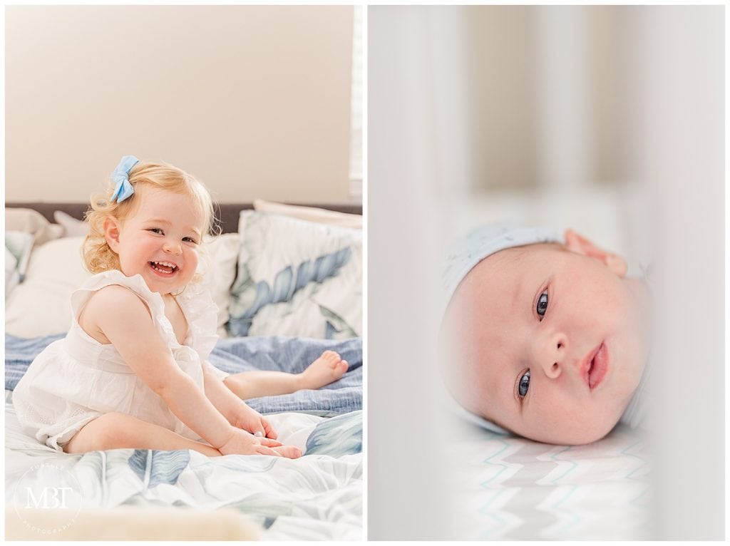 big sister sitting on the bed smiling, while baby boy is on his crib during in home newborn pictures in Fairfax County, Virginia, taken by TuBelle Photography, a Northern VA newborn photographer
