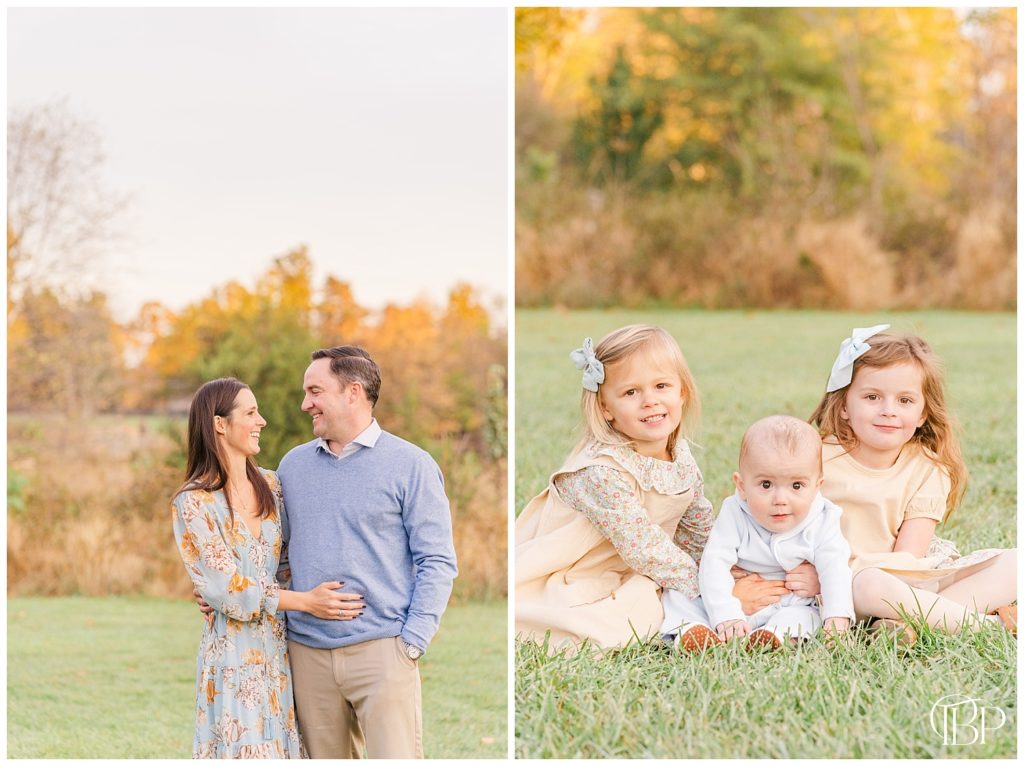 Mom and dad look at one another. Big sisters huddle around baby brother for their fall mini session in Sterling, Virginia. Taken by TuBelle Photography, a NoVa Photographer.