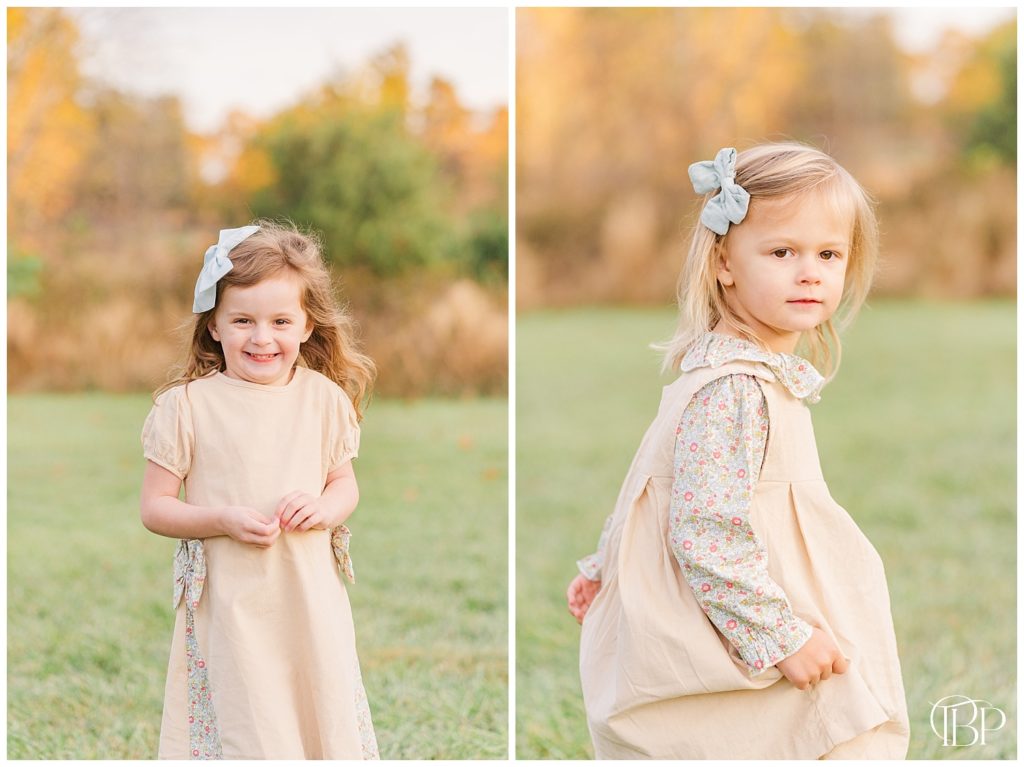 Two sisters smile at camera for fall minis in Northern Virginia. Taken by TuBelle Photography, a Northern VA Photographer.
