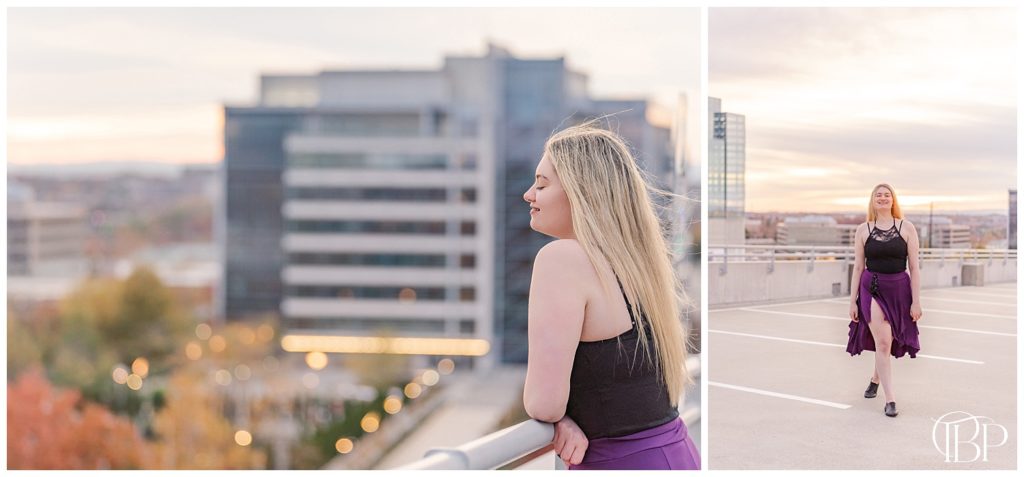 Senior girl leaning over parking garage rooftop looking out in sunset for senior session in Reston, Virginia. Taken by TuBelle Photography, a Northern VA Senior Photographer.