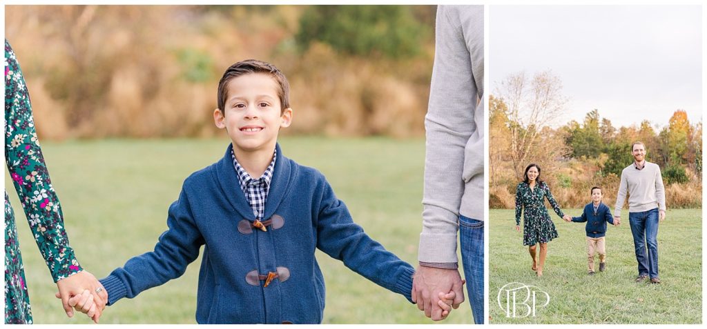 Mom and Dad holding son's hand for fall mini session in Sterling, Virginia. Taken by TuBelle Photography, a NoVa Photographer.