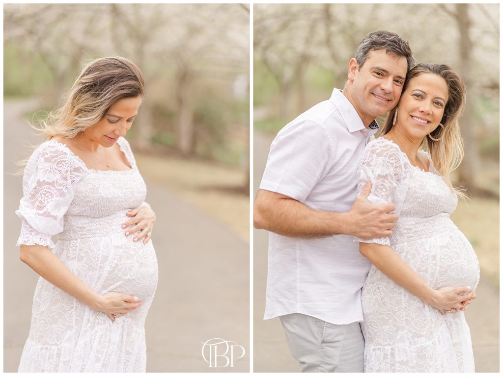 Dad standing behind expecting mom smiling and mom standing alone, looking down at her baby bump for their maternity photos at Meadowlark Botanical Gardens in Vienna, Virginia. Taken by TuBelle Photography, a Northern VA maternity photographer.