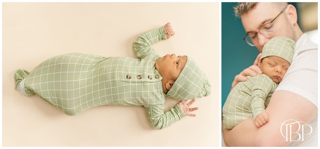 Dad holding newborn baby boy and baby boy lying in his crib in a green baby gown for their living room newborn photos. Taken by TuBelle Photography, a Fairfax County, Virginia Newborn Photographer.