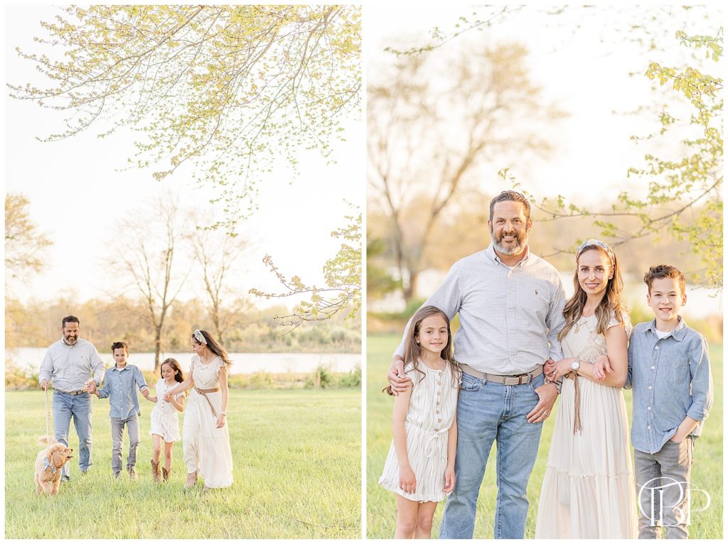 Family of four hold hands and walk with their dog in the park for their Haymarket, Virginia spring mini sessions taken by TuBelle Photography.