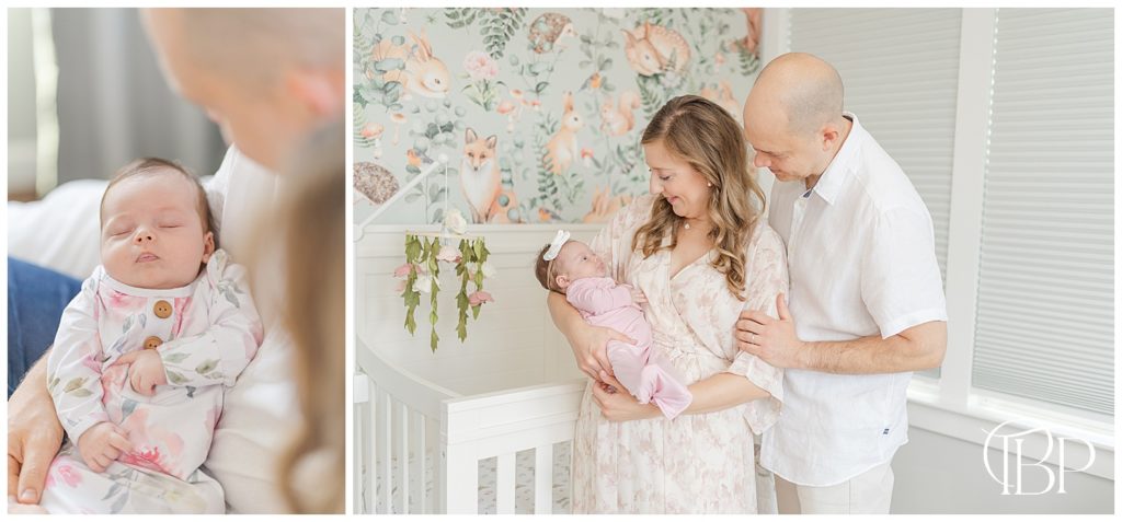 Mom and dad hold baby girl in nursery for their lifestyle newborn photography taken by TuBelle Photography, a Centreville, VA newborn photographer.