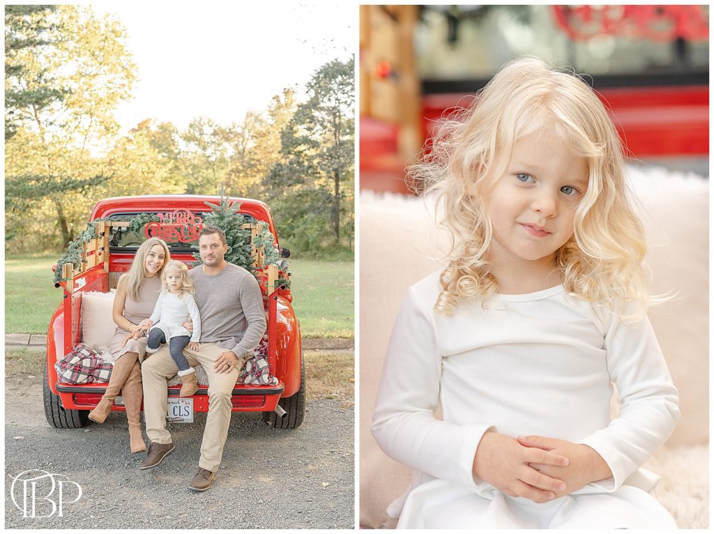 family of 3 pose for photos during red truck mini session in Northern Virginia