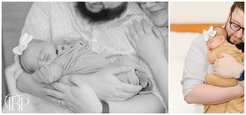 Baby girl hugged and adored by parents during Haymarket, Virginia lifestyle newborn photography