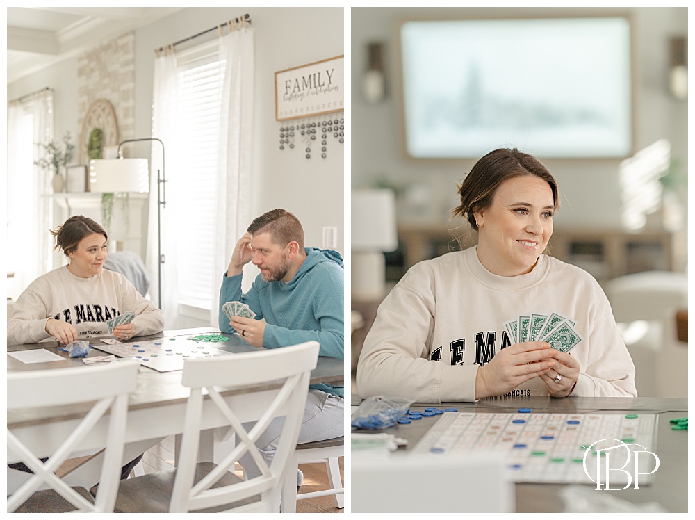 Family playing board game during lifestyle photos in Fairfax, Virginia