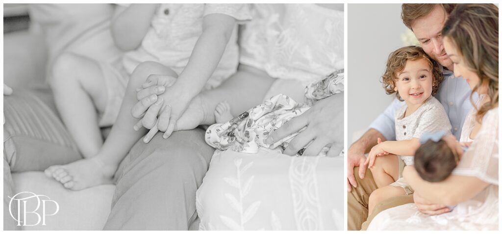 Big brother holding on to mom's hand during in home newborn session in Centreville, VA