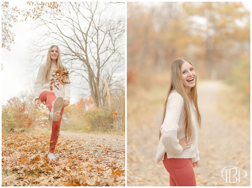 High school girl kick leaves during fall senior pictures in Gainesville, Virginia