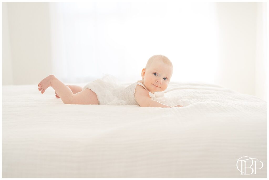 Tummy time during 6 month baby photoshoot