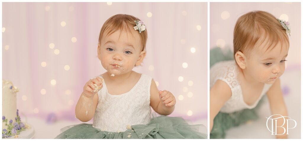 Baby happily eating cake