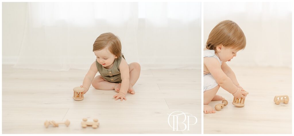 Baby playing with toys during simple cake smash photography in Ashburn, VA