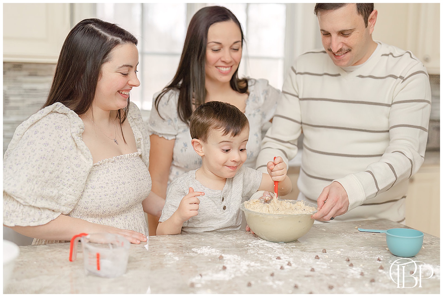 family baking in the kitchen during lifestyle photography