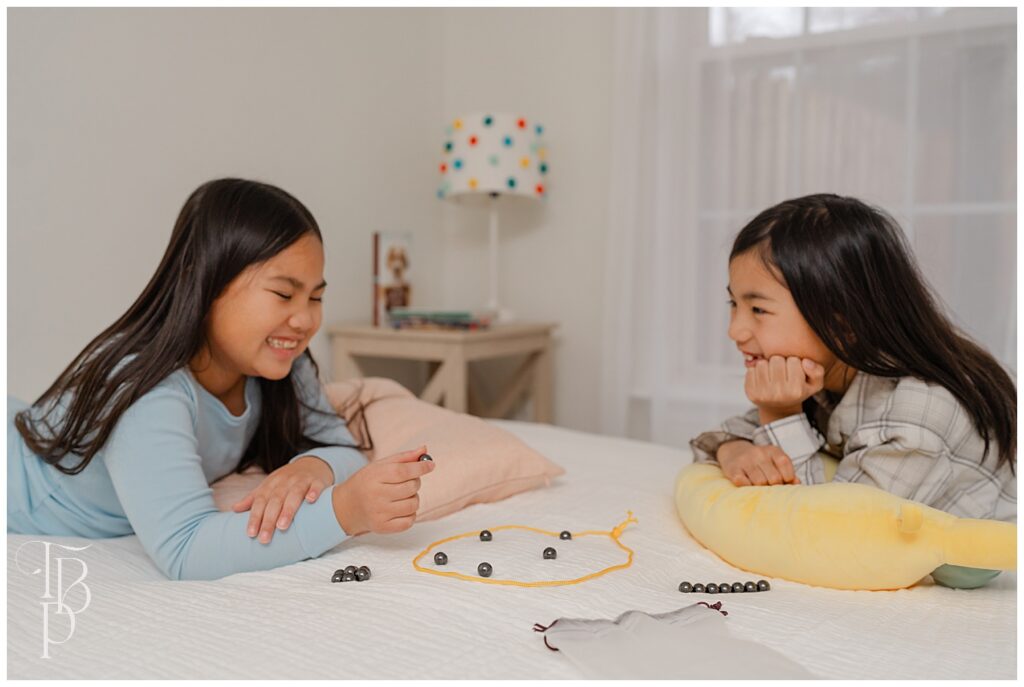 Siblings playing a game