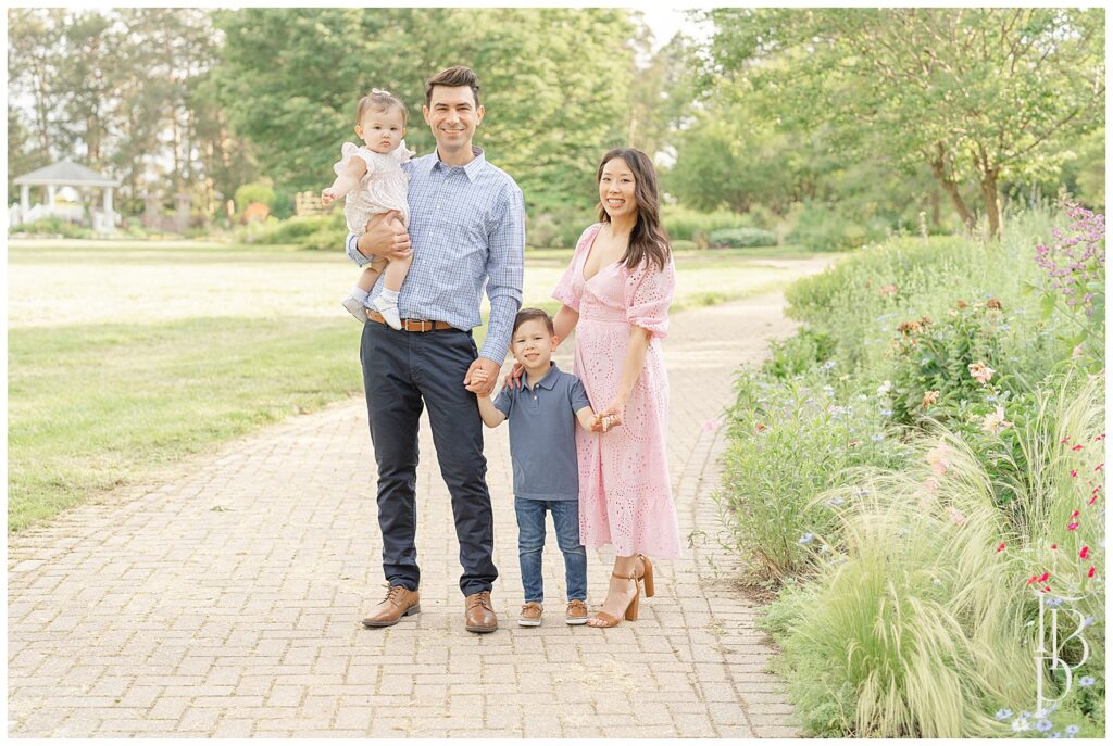 Family posing for photos in garden