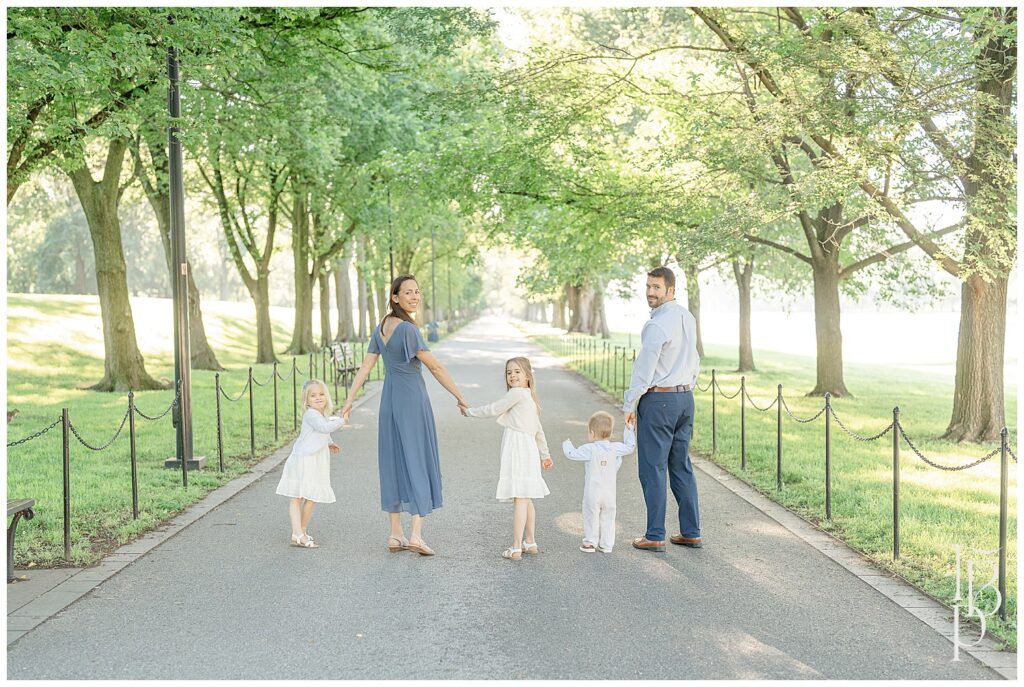 Family walking away at a park