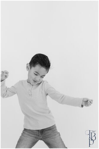 boy showing his personality in pictures