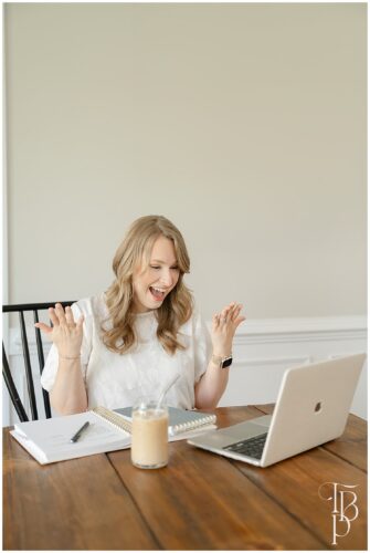 Woman smiling while talking to someone